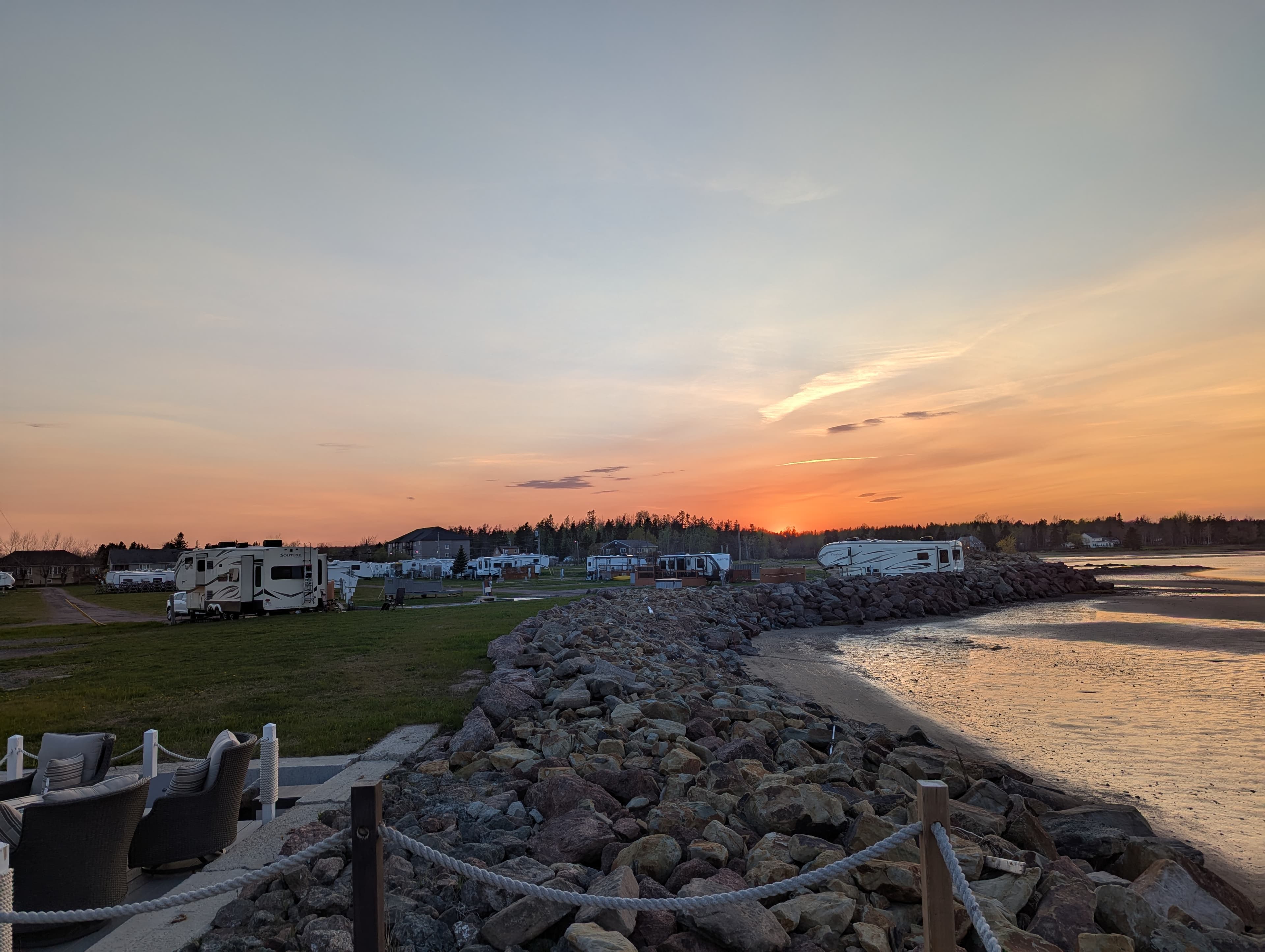 Panoramic sunset view of RV sites at Wishing Star Camping overlooking Shediac Bay